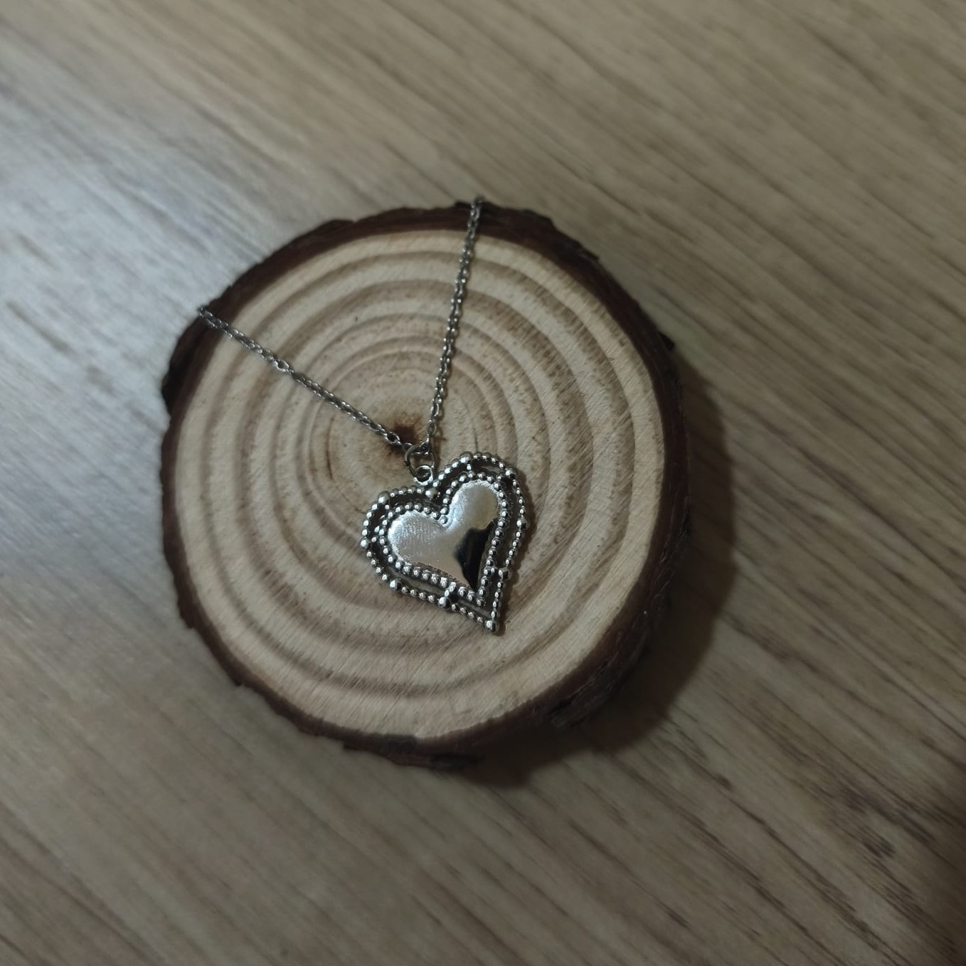 COLGANTE CORAZÓN DE ACERO INOXIDABLE