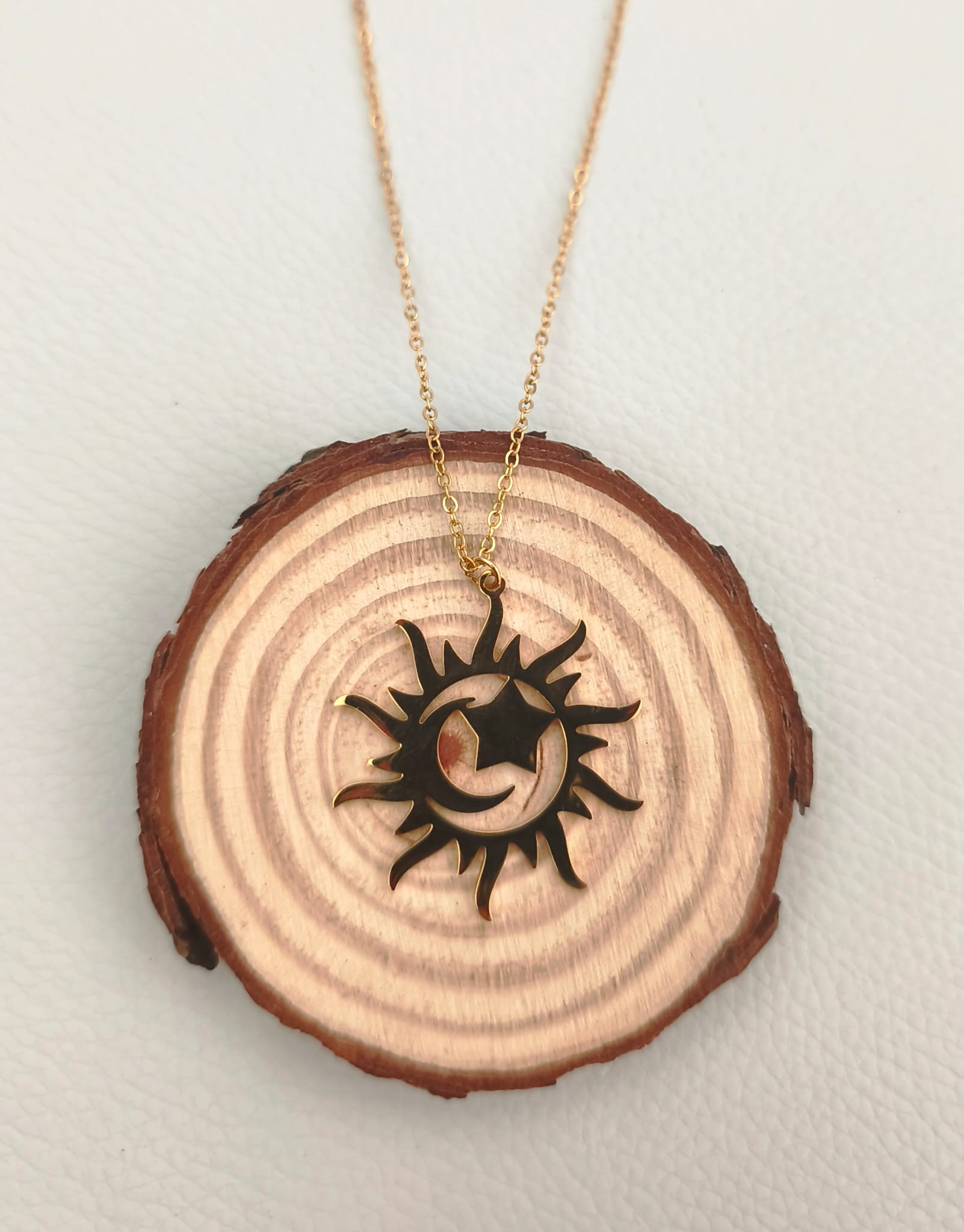 COLGANTE SOL, LUNA Y ESTRELLA DORADO